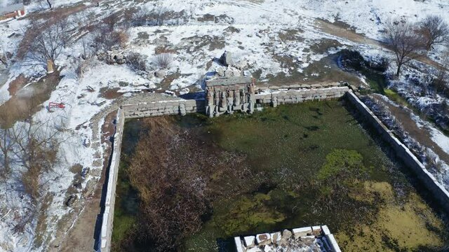 Hittite Holy Water Temple, ancient Hittite monument Eflatun Spring. winter time. 4K. aerial view.