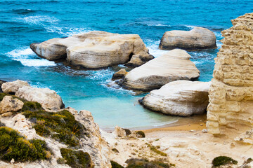 Golden beach with rocks background, Cliffs in the sea, Top aerial view of Cyprus, Nature Background with ocean with sand