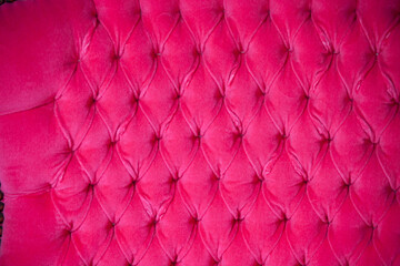 background with bright pink upholstered old-fashioned furniture textile