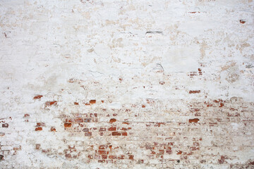 old ruined red brick wall