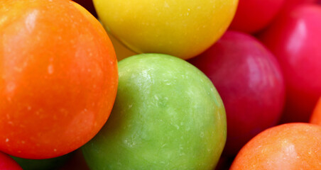 close-up colorful gum balls in the background