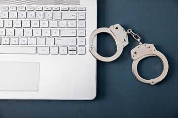 handcuffs on the laptop