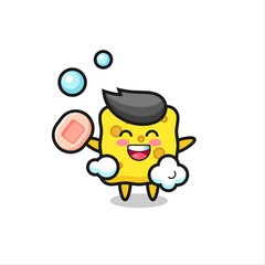 sponge character is bathing while holding soap