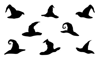 Black silhouettes of halloween witch hats.
