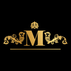 GOLDEN LETTER M INSIDE ORNAMENTAL FRAME