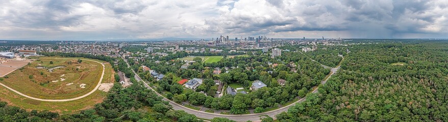 Fototapeta na wymiar Drone panorama over the Frankfurt skyline taken from the south during an approaching thunderstorm