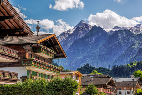 Kaprun village with typical pension against Kitzsteinhorn glacier in Salcburg region, Austrian Alps