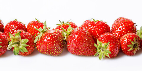 Food banner. Group of sweet ripe strawberries on a white background. Juicy and tasty strawberries. Organic farmer food. Close-up. Seasonal antioxidant and detox nutrient in human health.