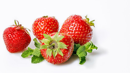 Food banner. Ripe strawberries and fresh mint on a white background. Sweet juicy strawberries and mint leaves. Copy space. Seasonal antioxidant and detox nutrient. Cholesterol-free, low-calorie food.