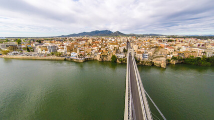 aerial views of the ebro river with boats and villages