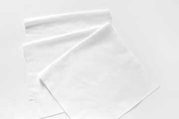 Obraz premium White cotton fabrics swatches on light background. Textile Mockup