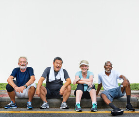 Fototapeta premium Group of senior friends relaxing together after an exercise