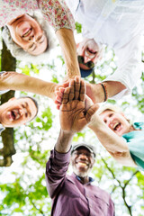 Group of diverse seniors in the park teamwork concept