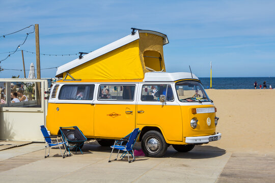 Scheveningen beach, the Netherlands - May 21, 2017: yellow VW combi camper wagen at Aircooled classic car show