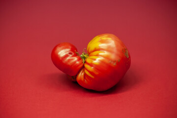 Heritage tomato on red