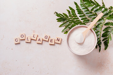 Collagen powder and quote collagen made of wooden blocks, top view