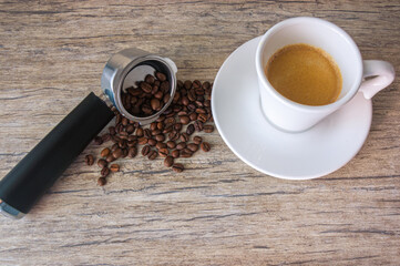 Grãos de café, xícara de café expresso /Coffee beans, cup of espresso