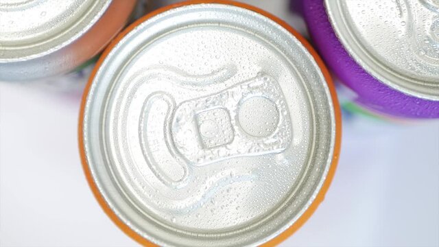Various Cold, Sweet, and Carbonated Refreshing Drinks. Shooting with Refreshing Pop Can Drinks.