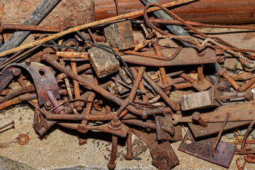 Rusty scrap metal on a summer day close-up