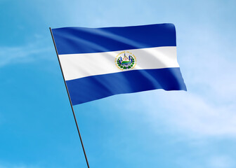 El Salvador flag flying high in the sky El Salvador independence day. World national flag collection