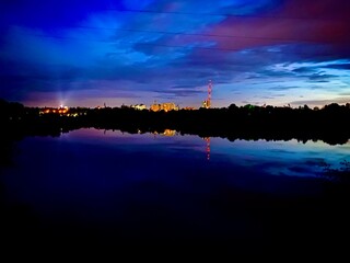 Naklejka premium sunset over the river