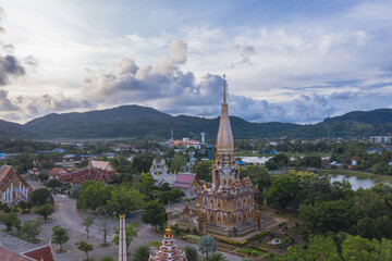 .aerial panorama view scenery sunset above Chalong pagoda in Phuket province..Chalong temple is the one popular landmark in phuket.colorful cloud scape sky sunset.travel culture concept.