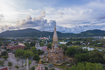 .aerial panorama view scenery sunset above Chalong pagoda in Phuket province..Chalong temple is the one popular landmark in phuket.colorful cloud scape sky sunset.travel culture concept.