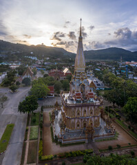 Fototapeta na wymiar .aerial panorama view scenery sunset above Chalong pagoda in Phuket province..Chalong temple is the one popular landmark in phuket.colorful cloud scape sky sunset.travel culture concept.