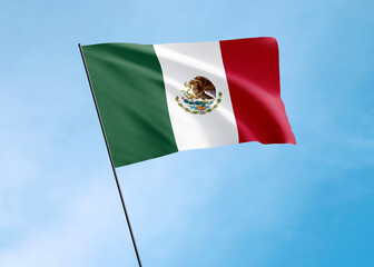 Mexico flag flying high in the sky Mexico independence day. World national flag collection