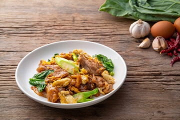 Stir fried flat noodle and pork with preserved soy bean paste