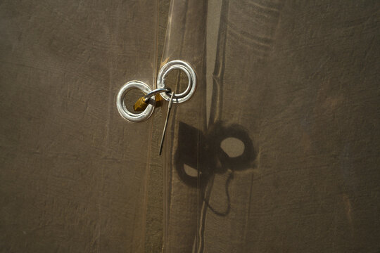Close-up Of Key Hanging On Door