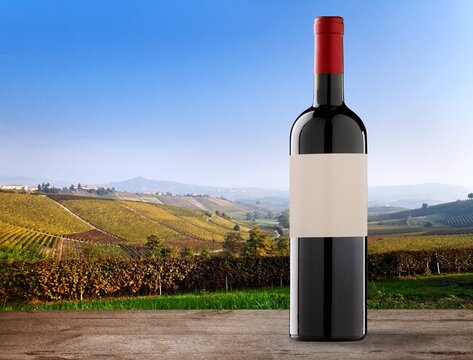 Wine Bottle With Blank Label On Landscape