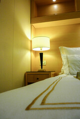 Comfortable double bed with duvet in luxurious oceanview or ocean view or outside or exterior...