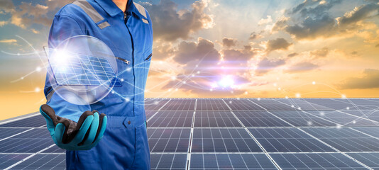Technician holding Solar cell and eco icon over solar cell system, Solar cell energy, Care of the...