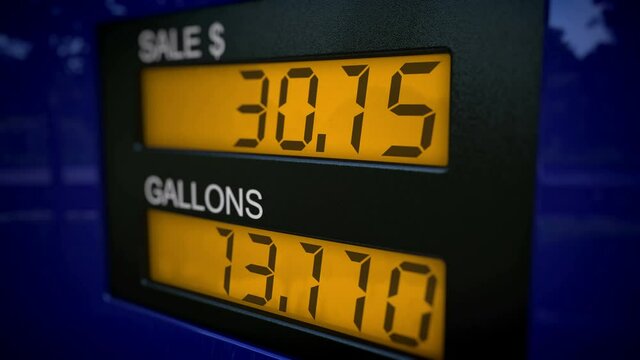 4K American gas pump display showing real-time fueling process. Slow zoom-in motion. 