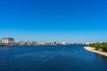 Naklejka premium Panoramic view of Podol district and Dnypro river from pedestrian bridge in Kyiv, Ukraine on August 30, 2020. 