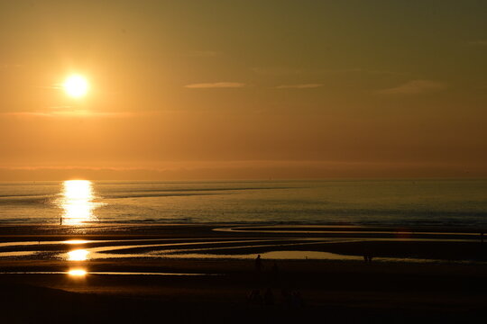 Sunset above Atlantic ocean in Koksijde, Belgium.