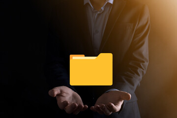 Businessman hold folder icon.Document Management System or DMS setup by IT consultant with modern...