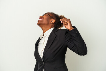 Young business african american woman isolated on white background dancing and having fun.