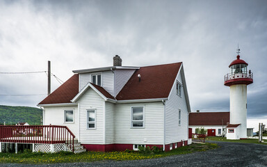 View on the Cap-De-La-Madeleine lighthouse on the north shore of the Gaspesie peninsula in Quebec (Canada)