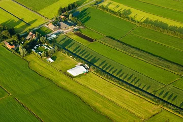 Fotobehang Hollandse landschappen vanuit een vliegtuig © AGAMI