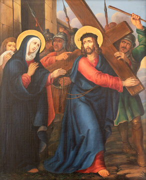 VIENNA, AUSTIRA - JUNI 17, 2021: The painting  Simon of Cyrene helps Jesus carry the cross as part of Cross way stations in church Rochuskirche by unknown artist.