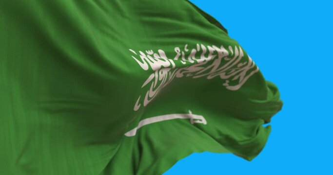 Close up of Saudi Arabia flag. Saudi Arabia flag waving in the wind.