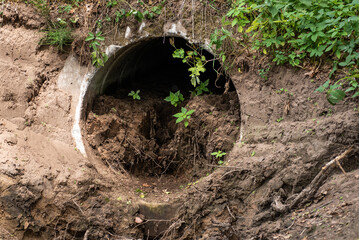 Old concrete culvert, filled with soil. 