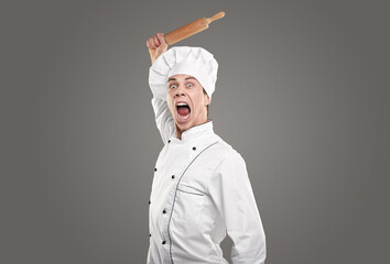 Funny brave chef with rolling pin