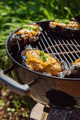 grilled potato with cheese and herbs