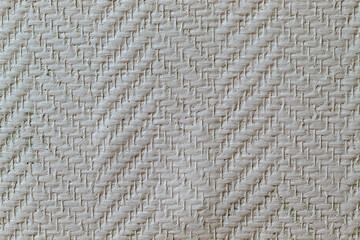 The texture of paper wallpaper for painting beige color with a pattern for designers