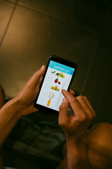 makes his shopping list in the bathroom