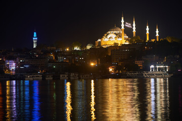 Fototapeta na wymiar Night view across the Bosphorus to the Suleymaniye Mosque