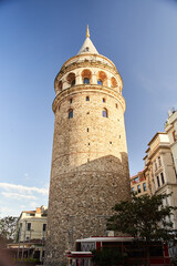 Fototapeta na wymiar Istanbul, Turkey - May 2, 2021: View of the Galata Tower through the street.